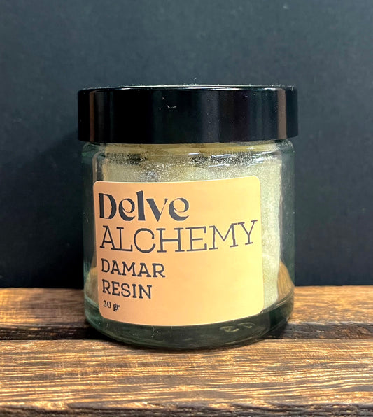 Delve Alchemy Damar Resin in a Clear Glass Jar with Black Lid