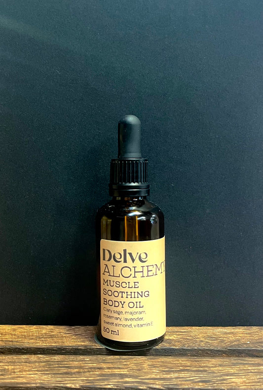 Muscle Soothing Body Oil by Delve Alchemy in an Amber Glass Bottle With Pipette 