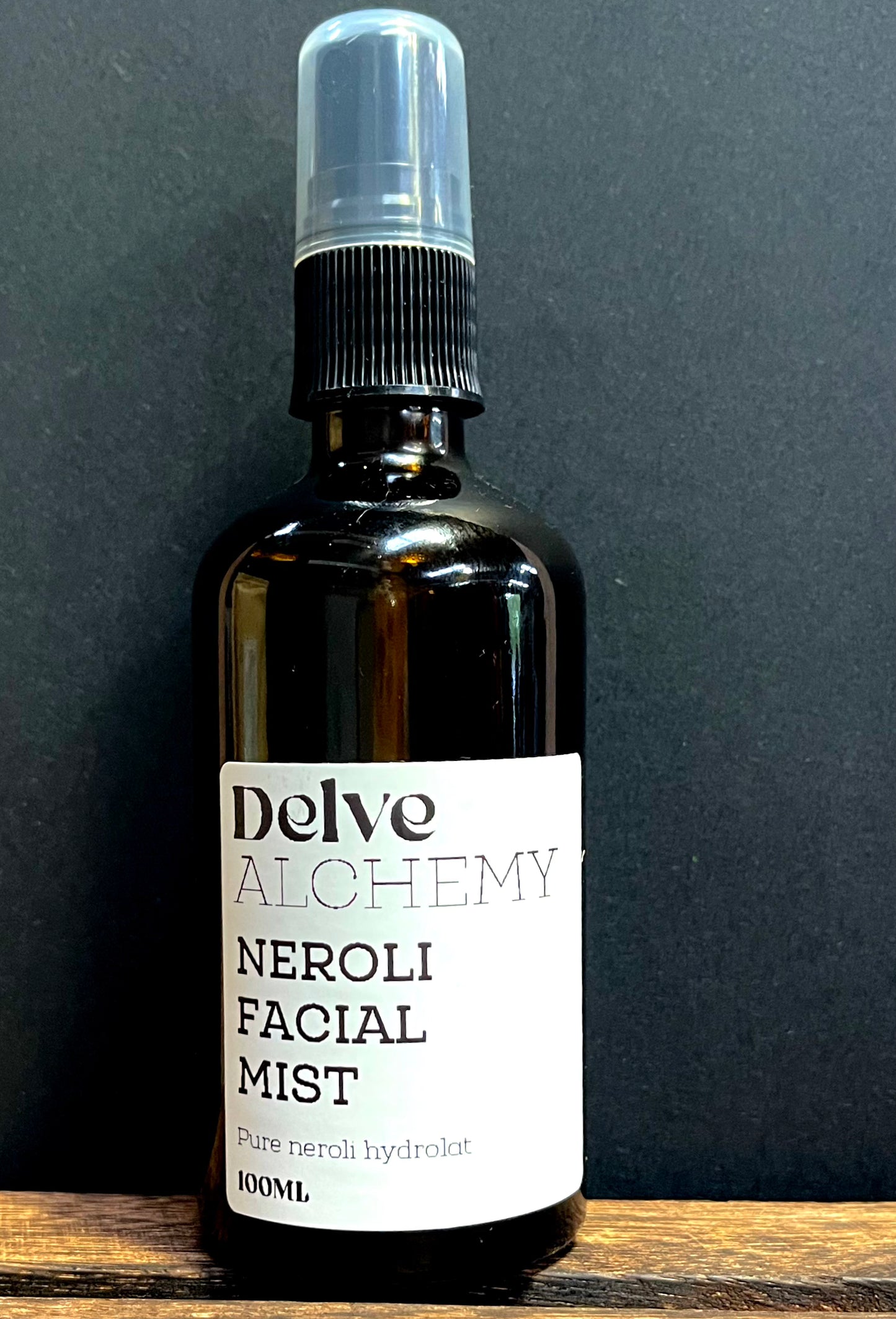 Delve Alchemy Natural Neroli Facial Mist in amber glass spray bottle with black pump